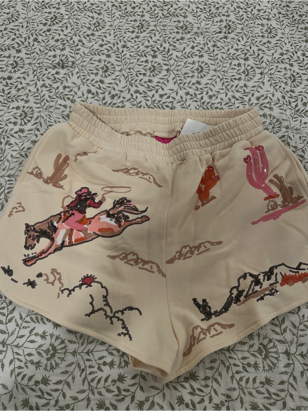 SOLD!! Queen of Sparkles rodeo beige bucking cowgirl sequin shorts sz L